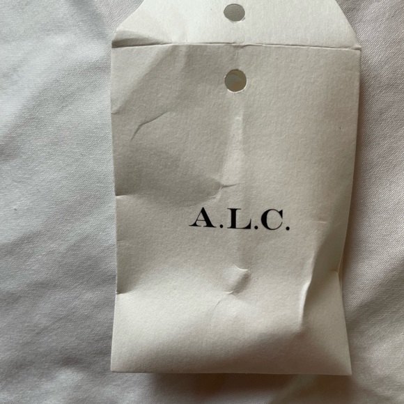 Snazzy Pleated Orange Asymmetrical A.L.C dress. - Picture 13 of 13